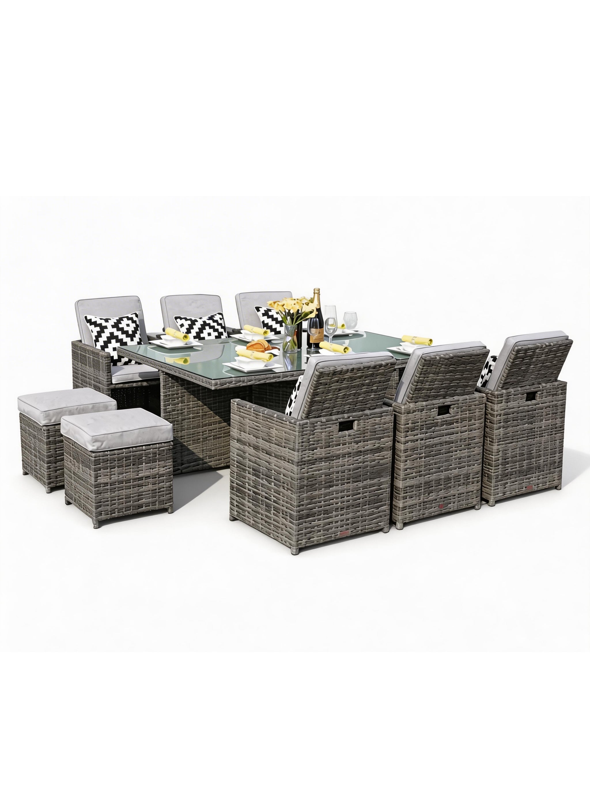 Outdoor furniture set with a table and chairs on a white background