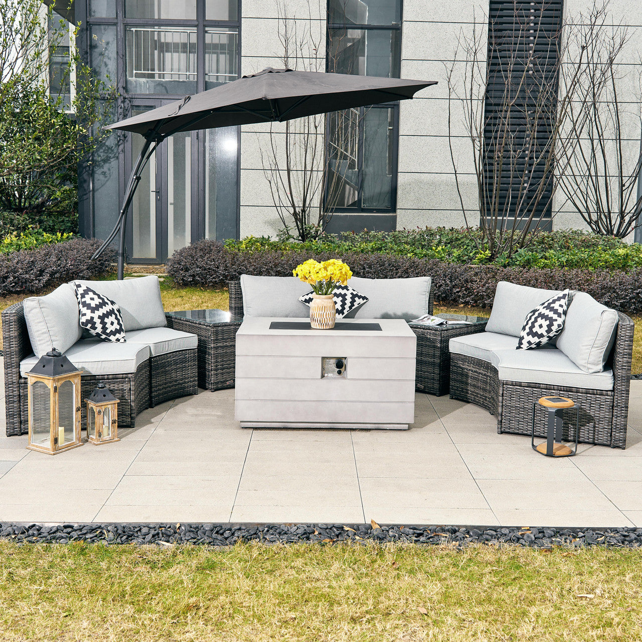 A stylish and versatile outdoor wicker sofa set with a fire pit table for ultimate comfort and warmth.