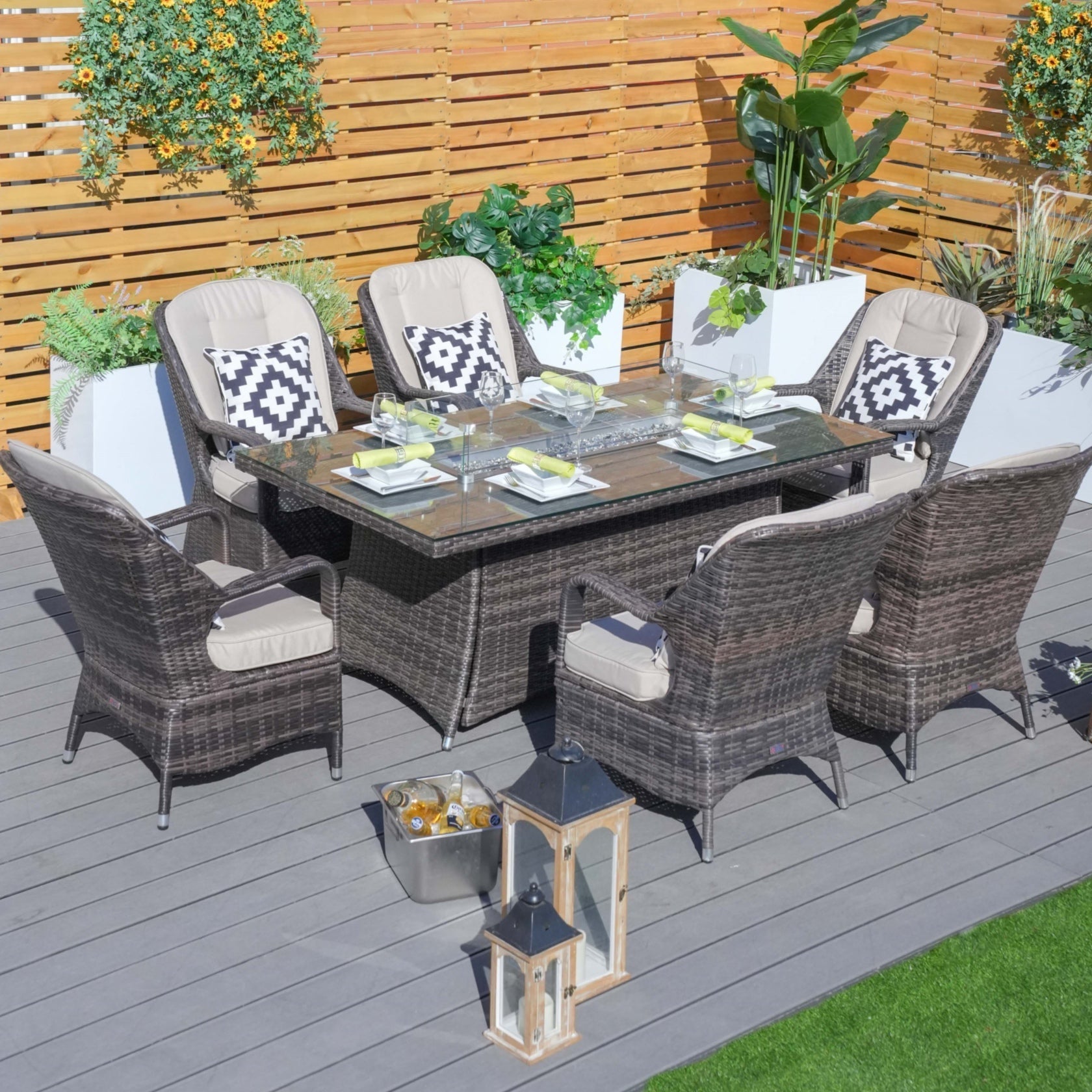 Outdoor patio set with table and chairs on a wooden deck