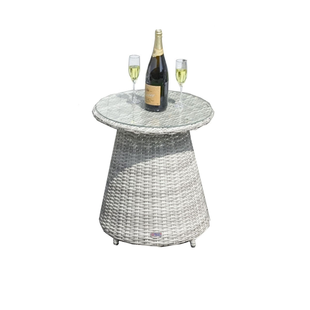 A round bistro table made of PE wicker with a rust-resistant aluminum frame, featuring a 5mm tempered glass tabletop, accompanied by a bottle and two glasses, intended for outdoor use.